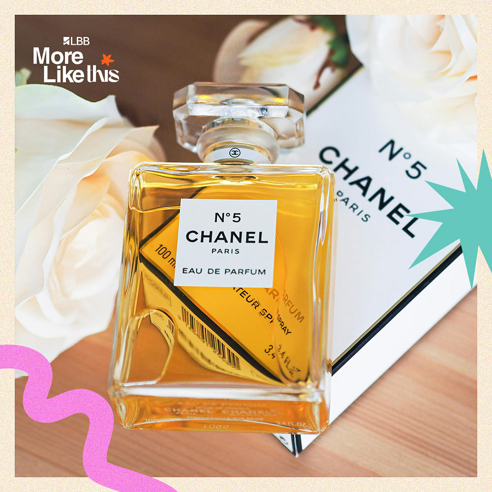 Perfume,Liquid,Personal care,Cosmetics,Packaging and labeling,Bottle,Advertising,Glass bottle,Box,Label
