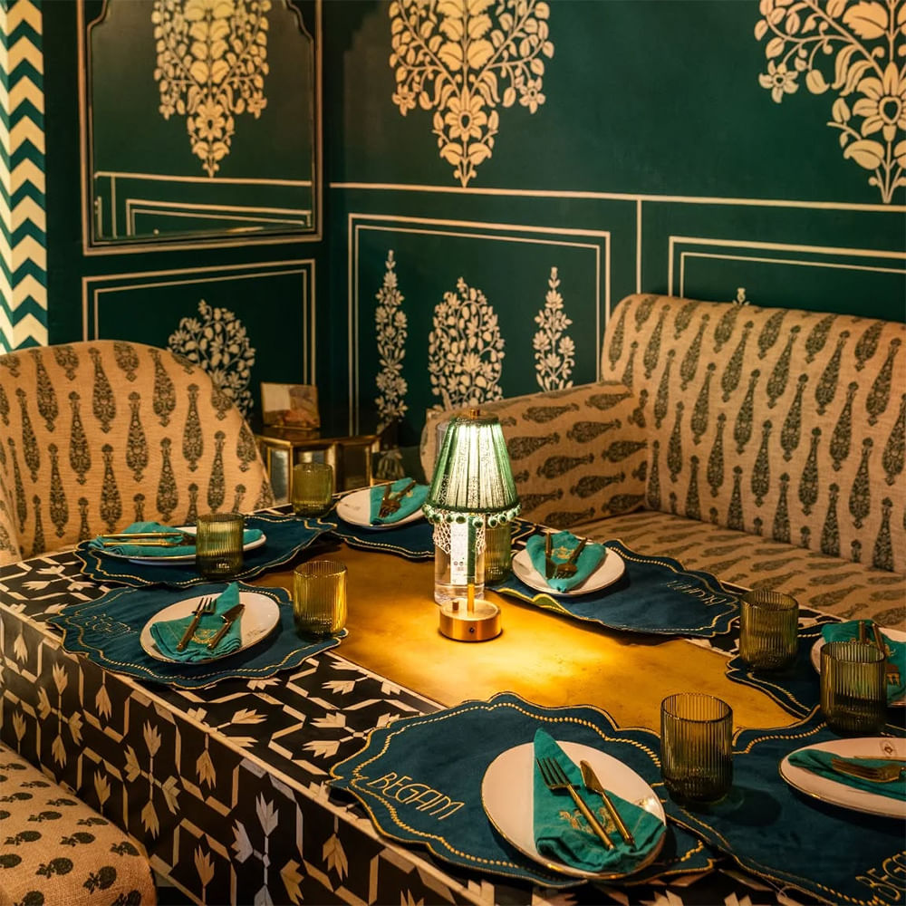 Textile,Furniture,Interior design,Table,Tablecloth,Restaurant,Chair,Dining room,Kitchen & Dining Room Table,Decoration