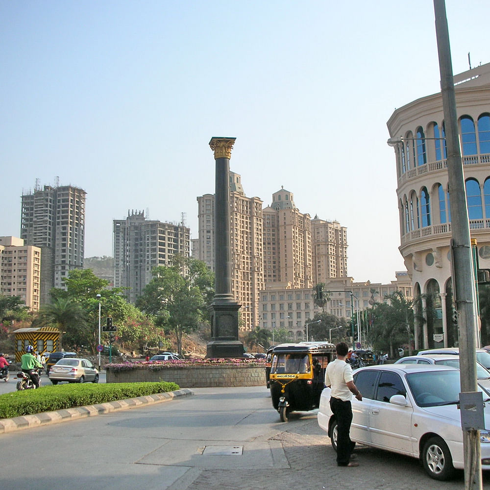Building,Urban area,City,Metropolitan area,Street,Public space,High-rise building,Tower,Asphalt,Metropolis