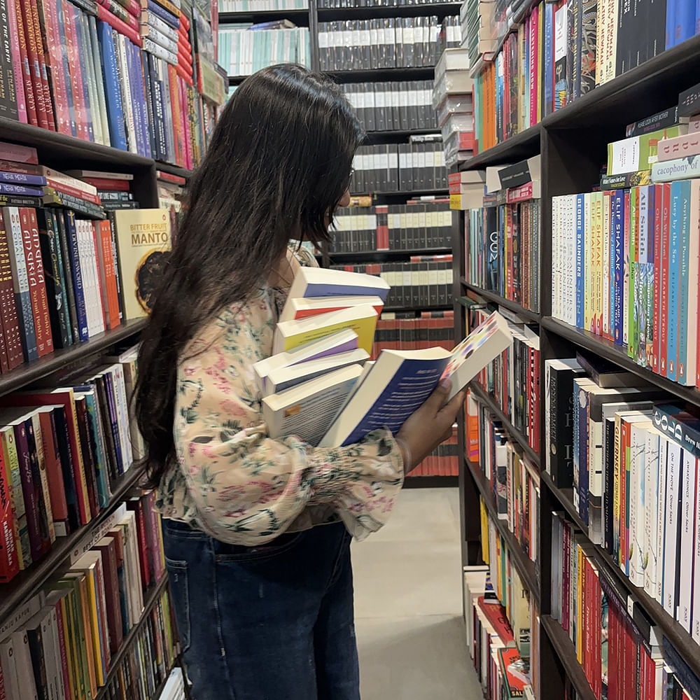 Bookcase,Shelf,Shelving,Book,Furniture,Publication,Library,Collection,Public library,Bookselling