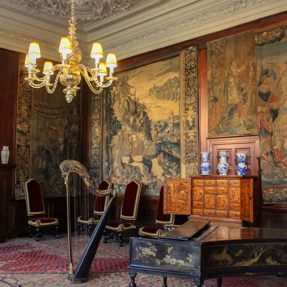 Furniture,Interior design,Flooring,Floor,Picture frame,Chair,Room,Ceiling,Wood stain,Antique