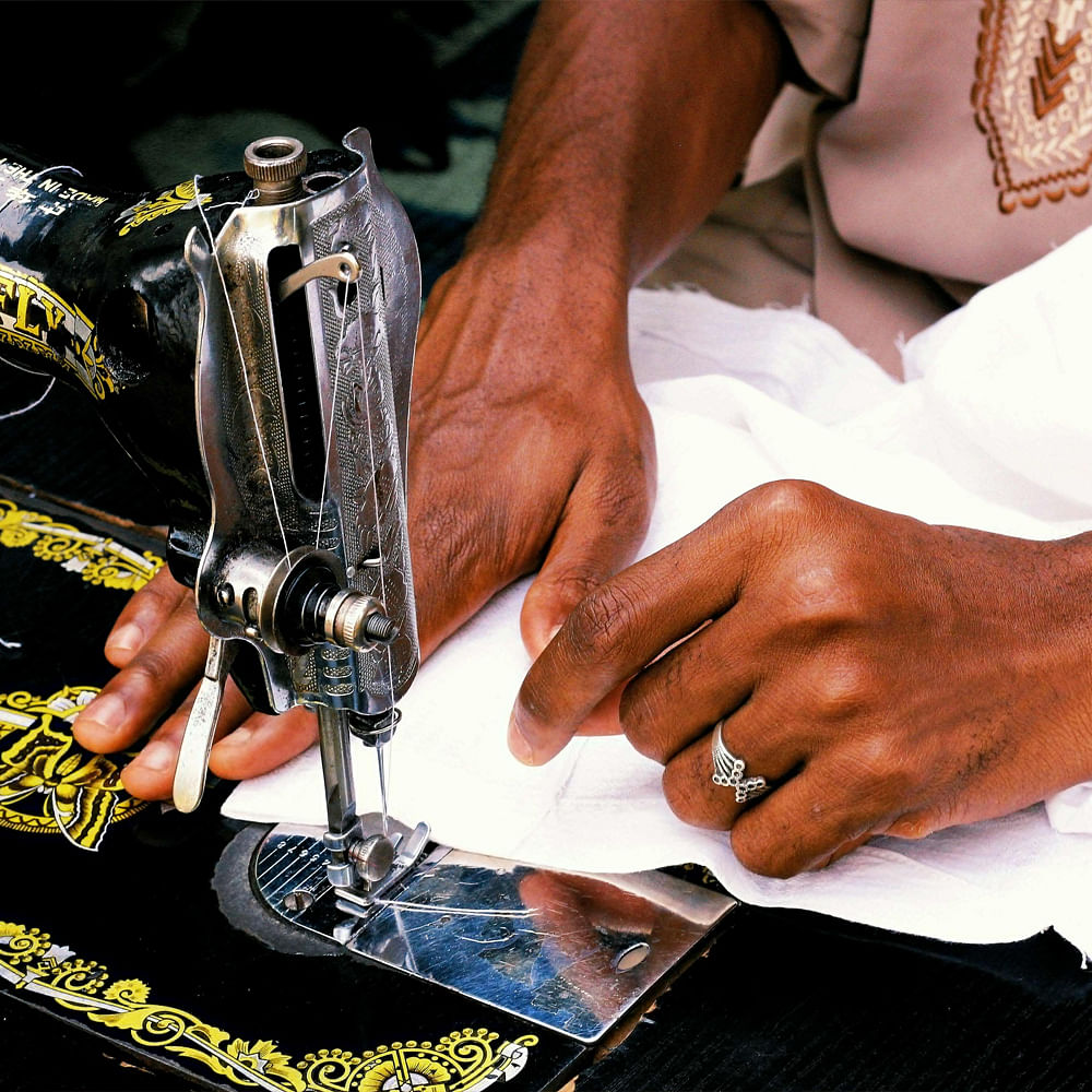 Sewing machine,Tailor,Dressmaker,Artisan,Sewing Machine Feet,Sewing,Machine,Creative arts,Craft,Stitch