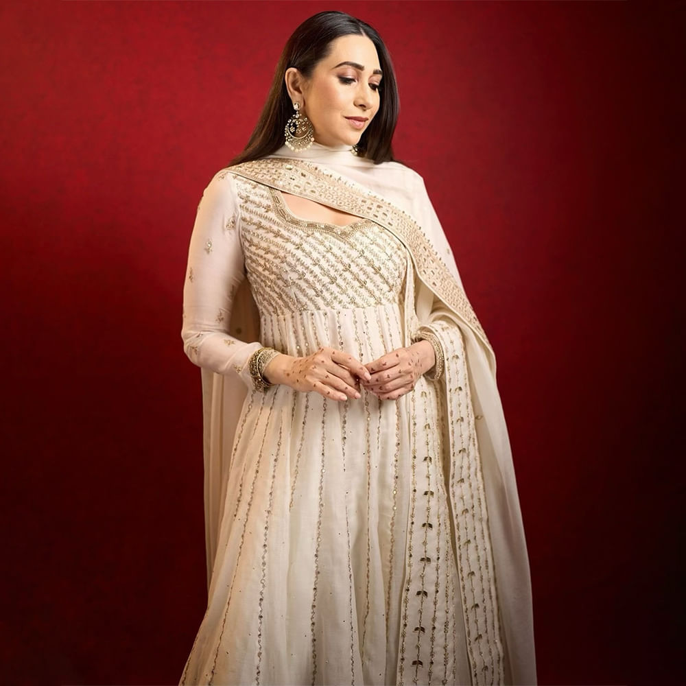 Sleeve,Fashion,Textile,Pink,Formal wear,Waist,Long hair,Fashion Model,Dress,Fashion design