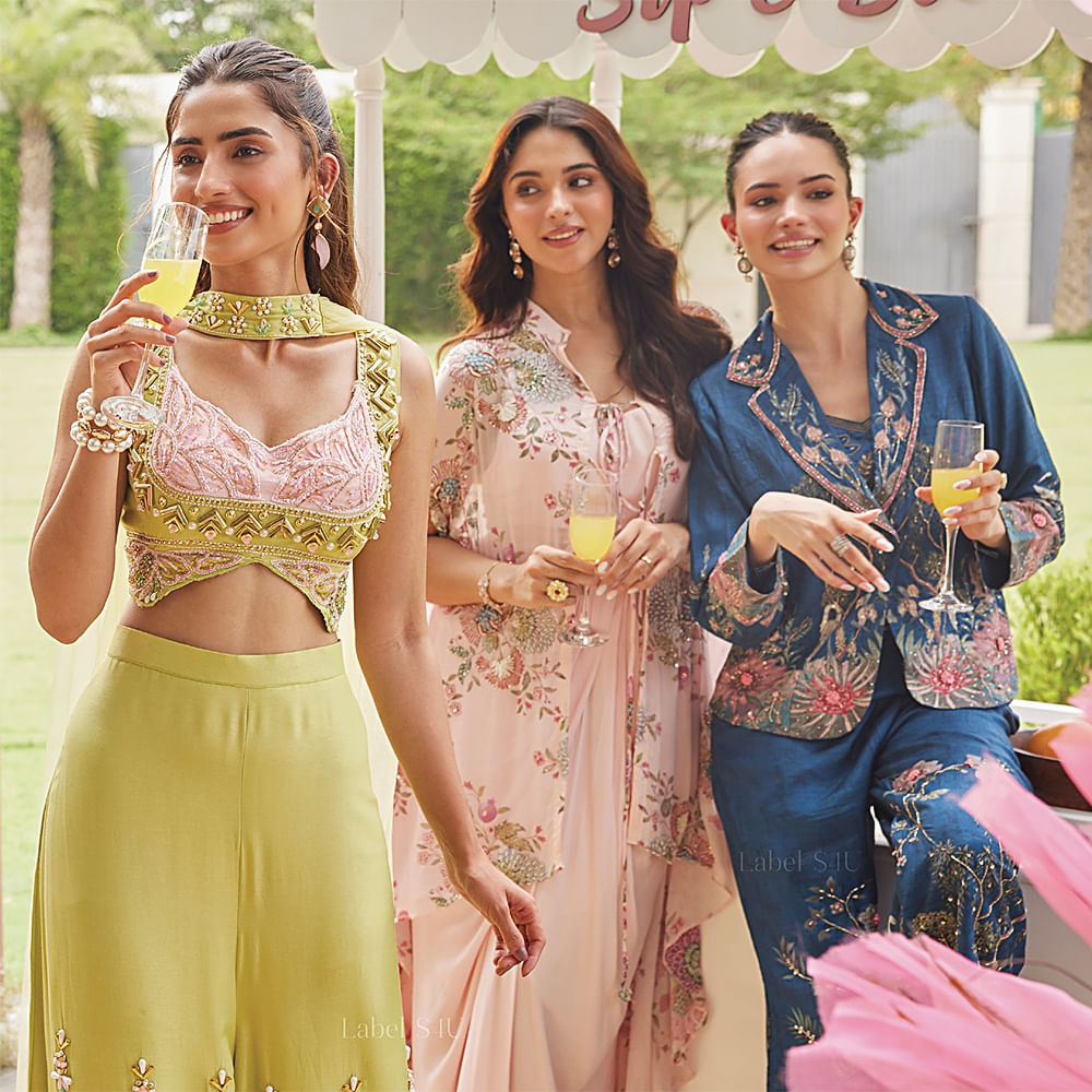 Fashion,Textile,Pink,Waist,Embroidery,Fashion design,Creative arts,Silk,Model,Embellishment