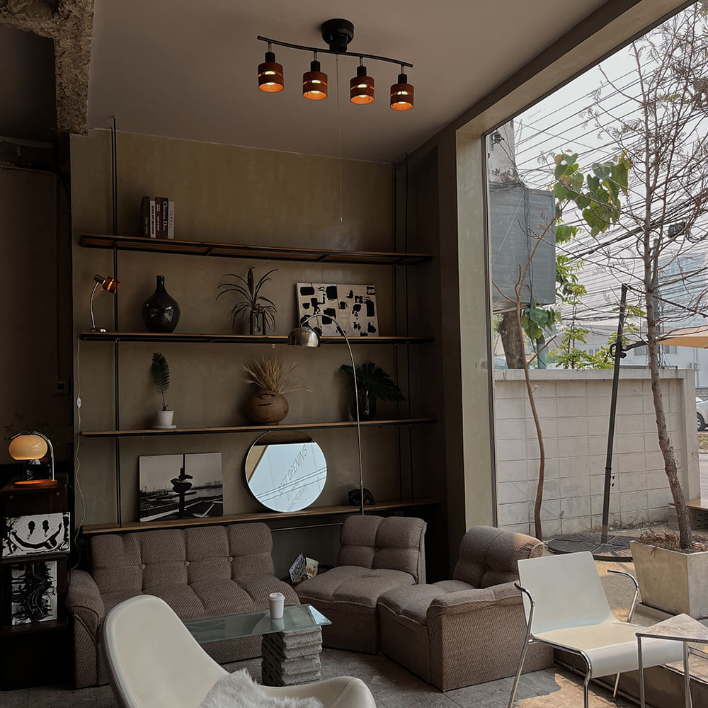 Furniture,Interior design,Wall,Flooring,Floor,Wood,Ceiling,Living room,Light fixture,Home