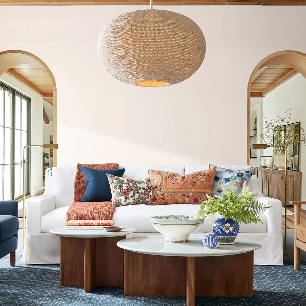 Furniture,Interior design,Table,Textile,Throw pillow,Living room,Flooring,Couch,Cushion,Room