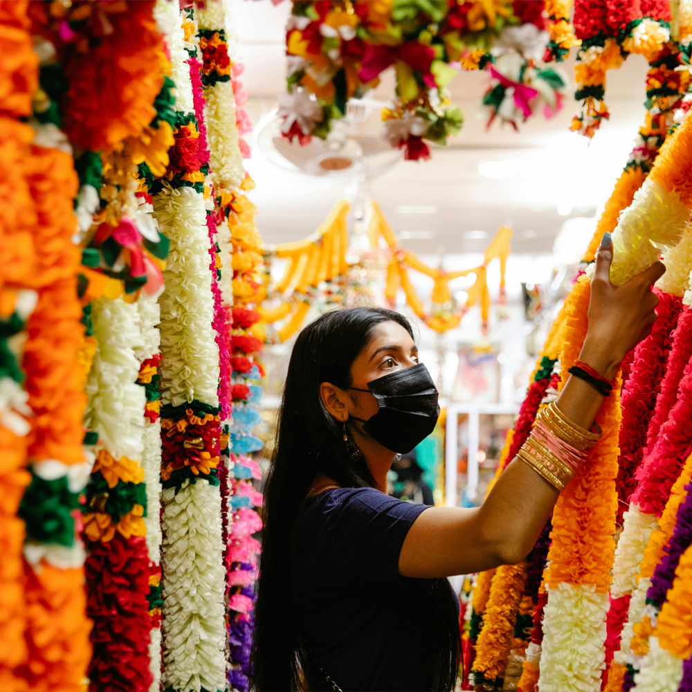 Yellow,Orange,Happiness,Tradition,Floral design,Flower Arranging,Decoration,Artificial flower,Ceremony,Cut flowers