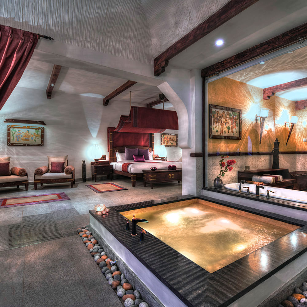 Interior design,Furniture,Lighting,Flooring,Floor,Ceiling,Resort,Light fixture,Living room,Hotel