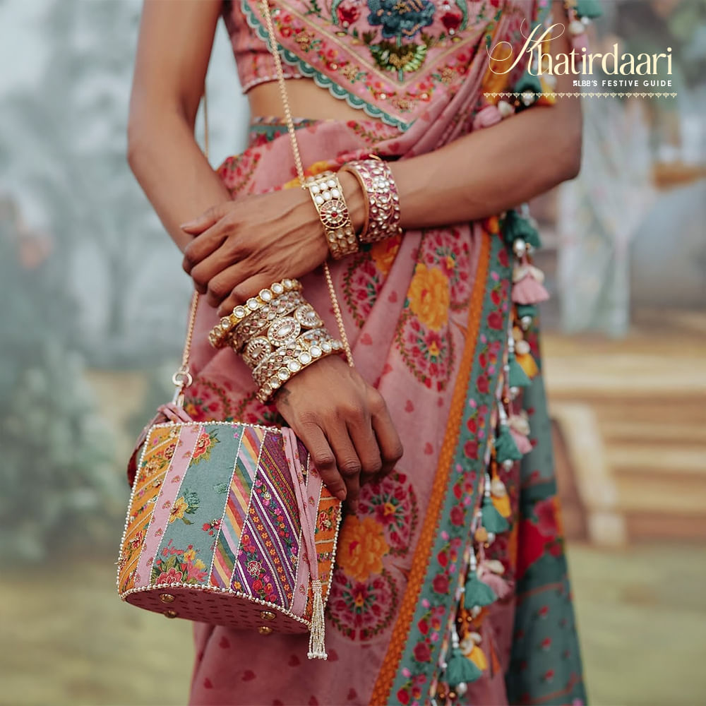 Textile,Pink,Creative arts,Craft,Natural material,Embellishment,Sari