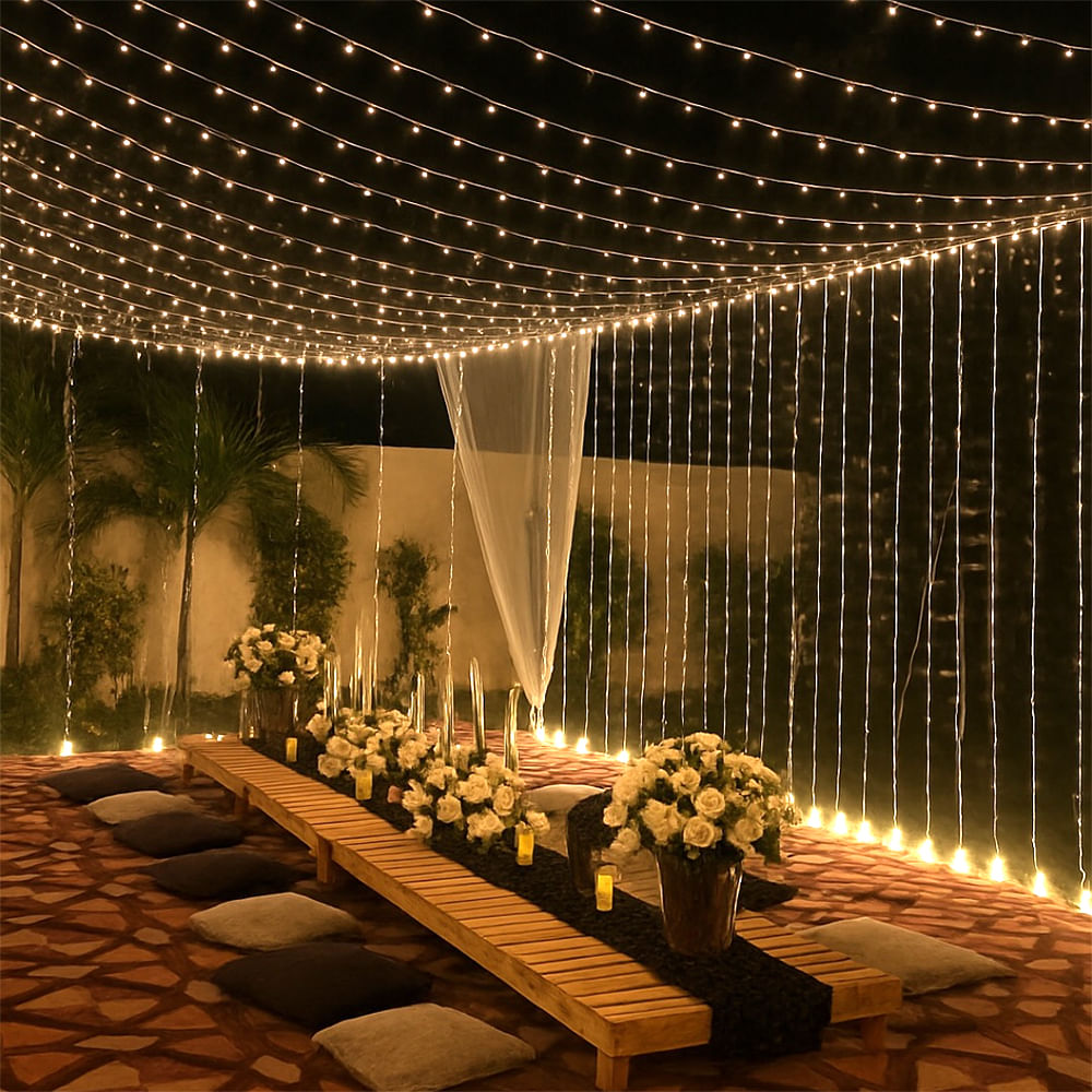 Lighting,Ceiling,Light fixture,Decoration,Night,Landscape lighting,Curtain,Hotel,Resort,Palm trees