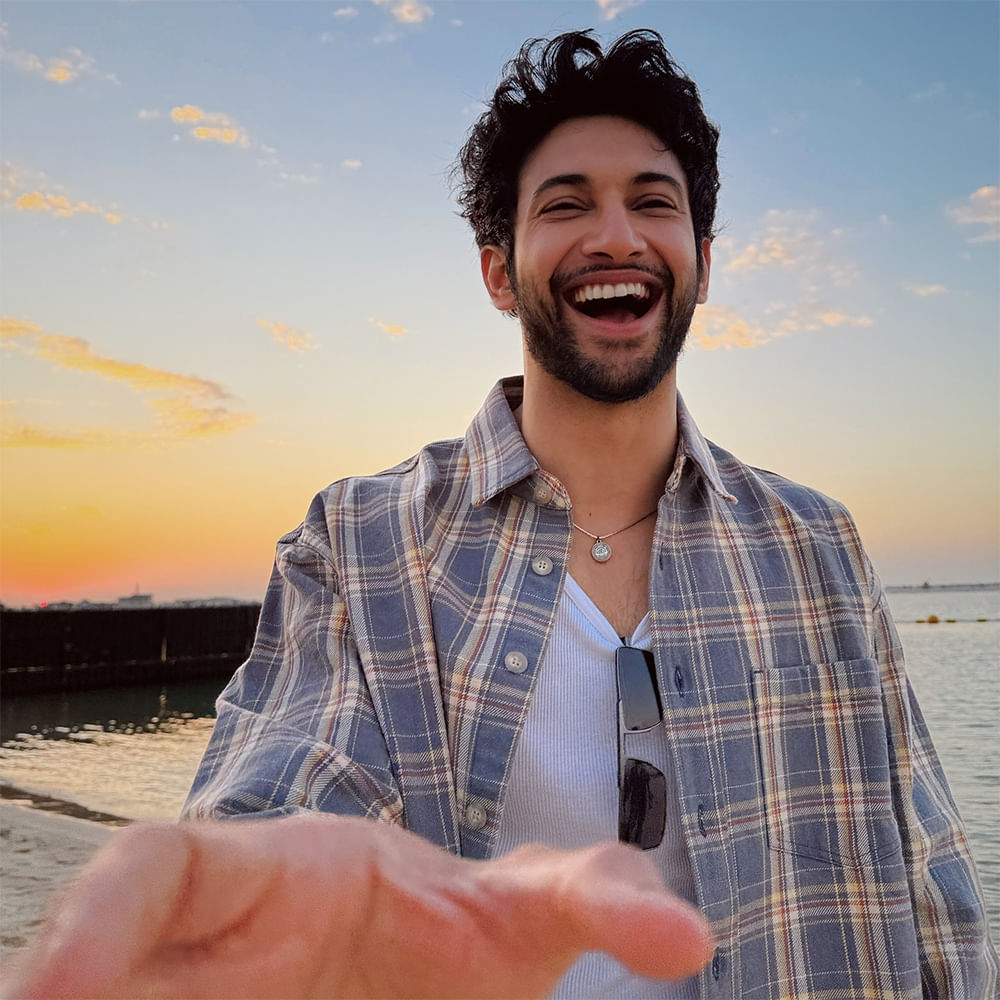 Happiness,Facial hair,Jaw,Smile,Beard,Facial expression,Moustache,Tooth,Dress shirt,People in nature