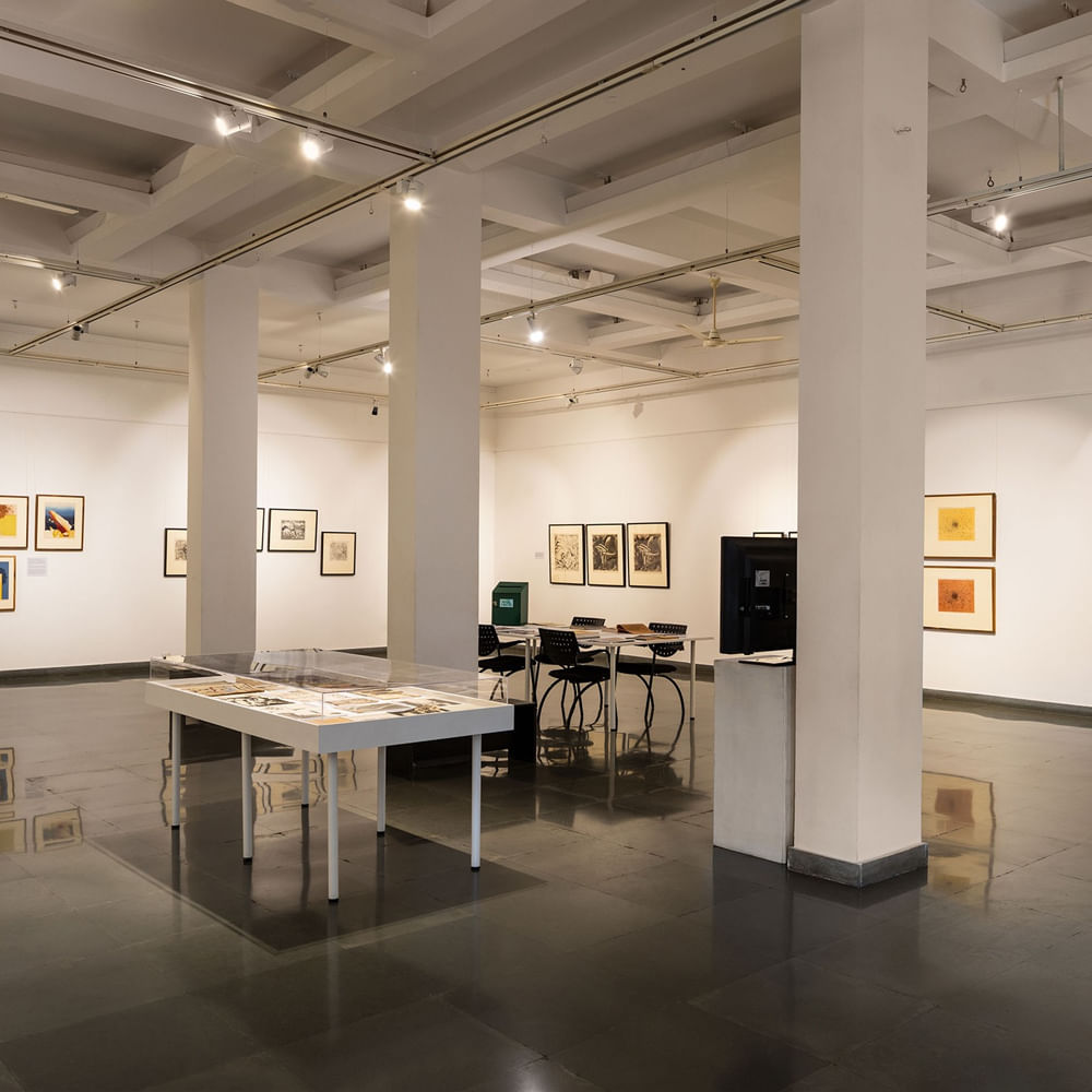 Flooring,Floor,Ceiling,Interior design,Lighting,Hall,Art museum,Exhibition,Wood flooring,Light fixture