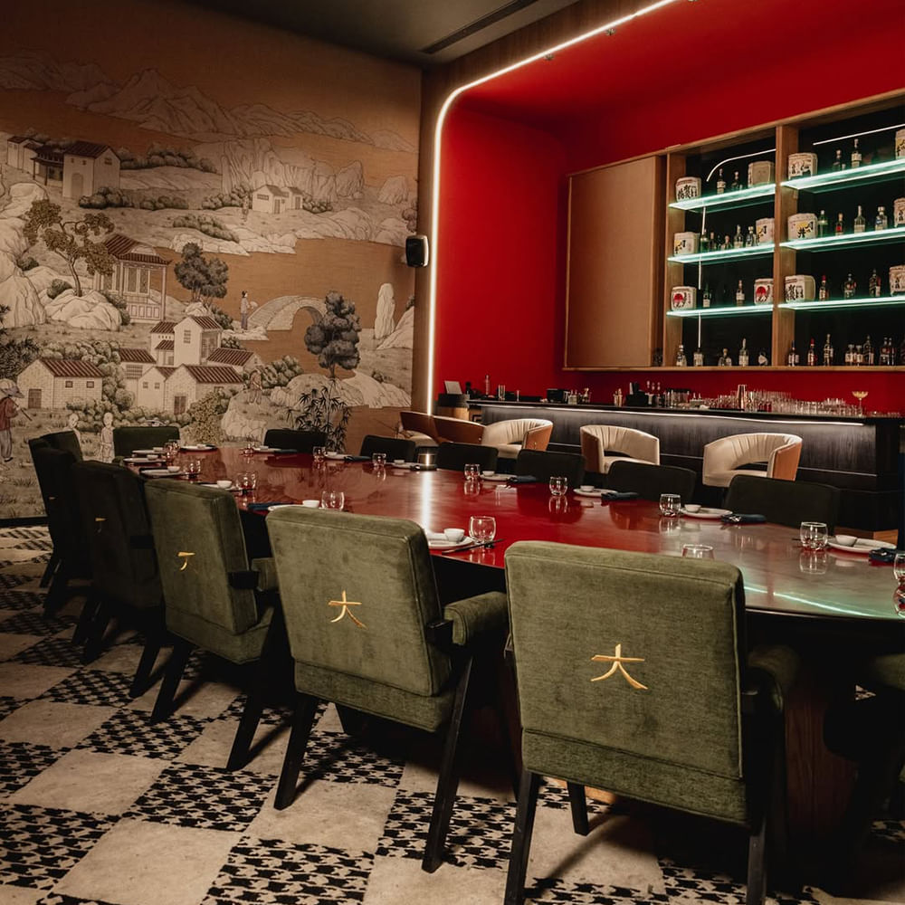 Restaurant,Chair,Bar,Light fixture,Barware,Sports car