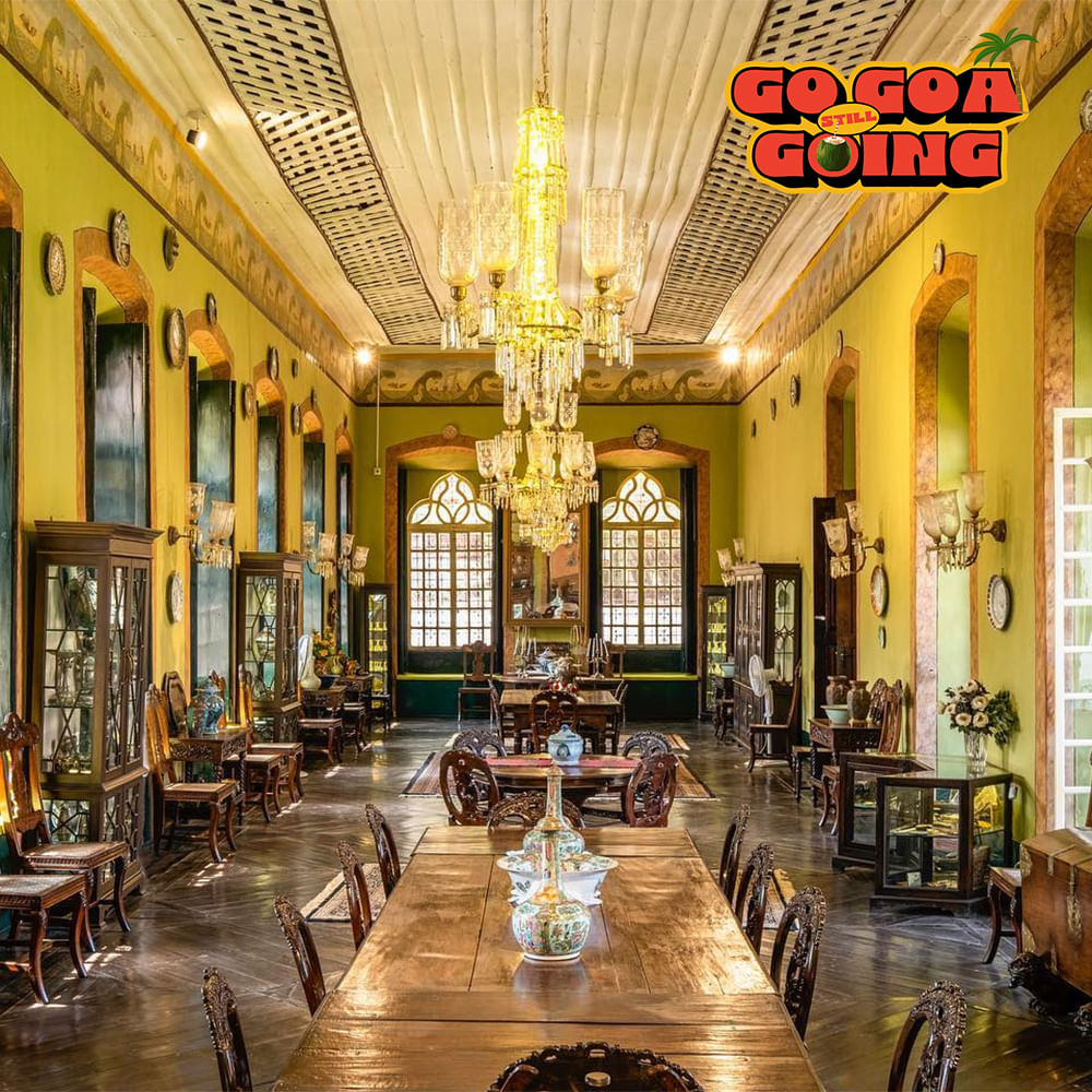 Furniture,Interior design,Ceiling,Chandelier,Table,Flooring,Lighting,Chair,Floor,Light fixture