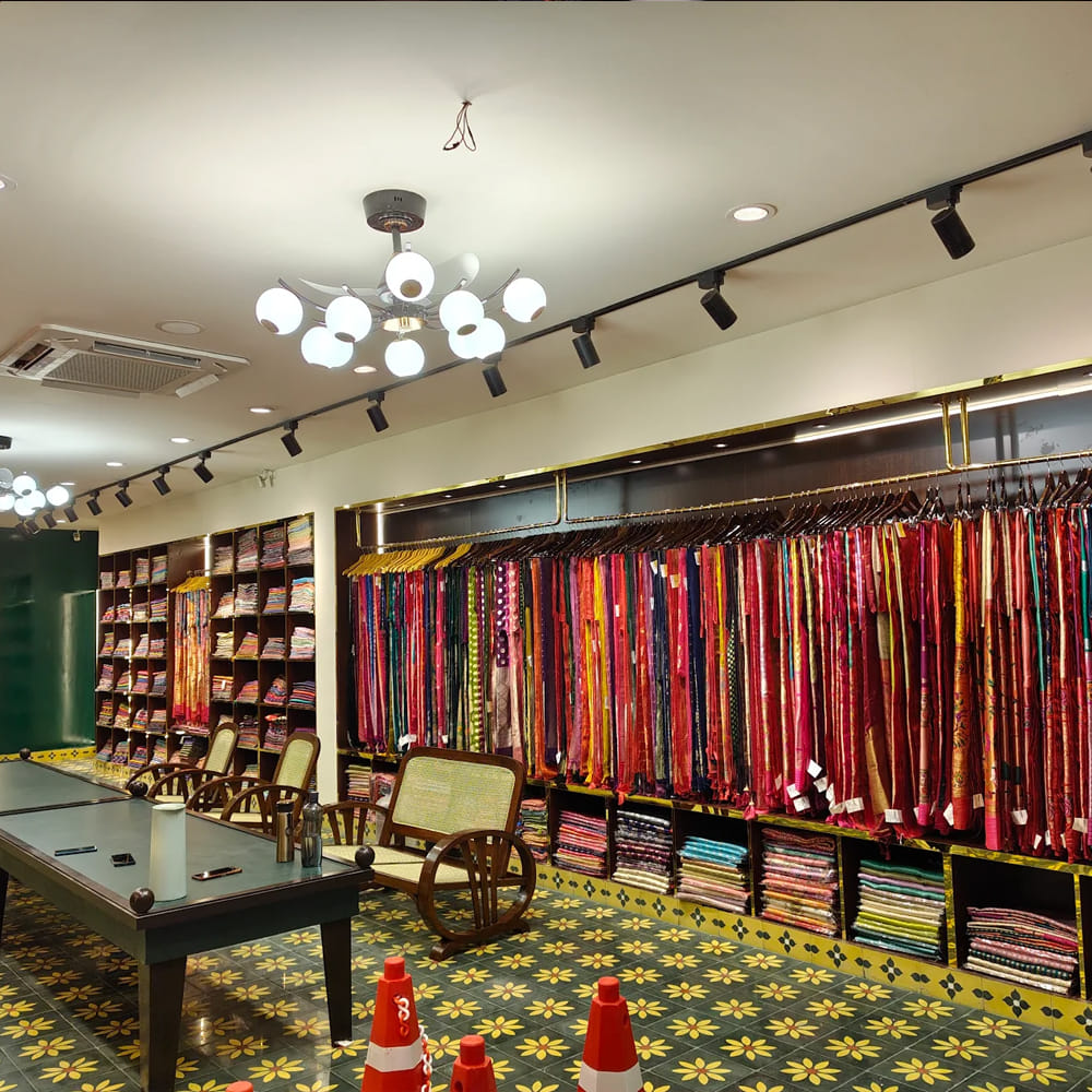 Interior design,Ceiling,Retail,Boutique,Collection,Design,Shelf,Shelving,Carpet,Outlet store